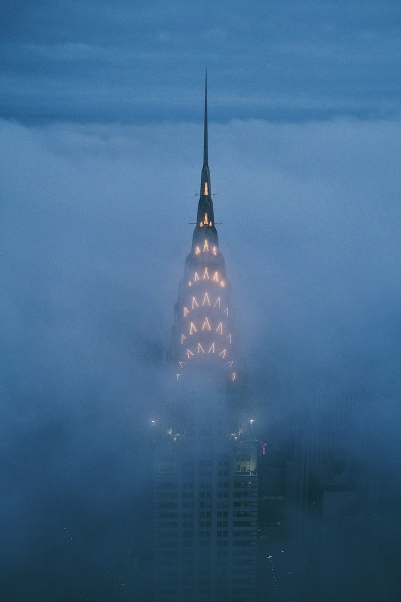 a tall building with lights at night